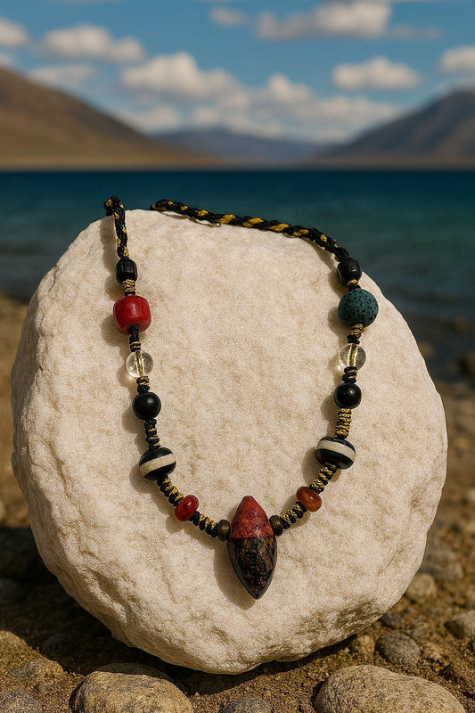Tibetan Nyagla Chacha clay relic necklace with One-Eye Dzi bead and volcanic stone