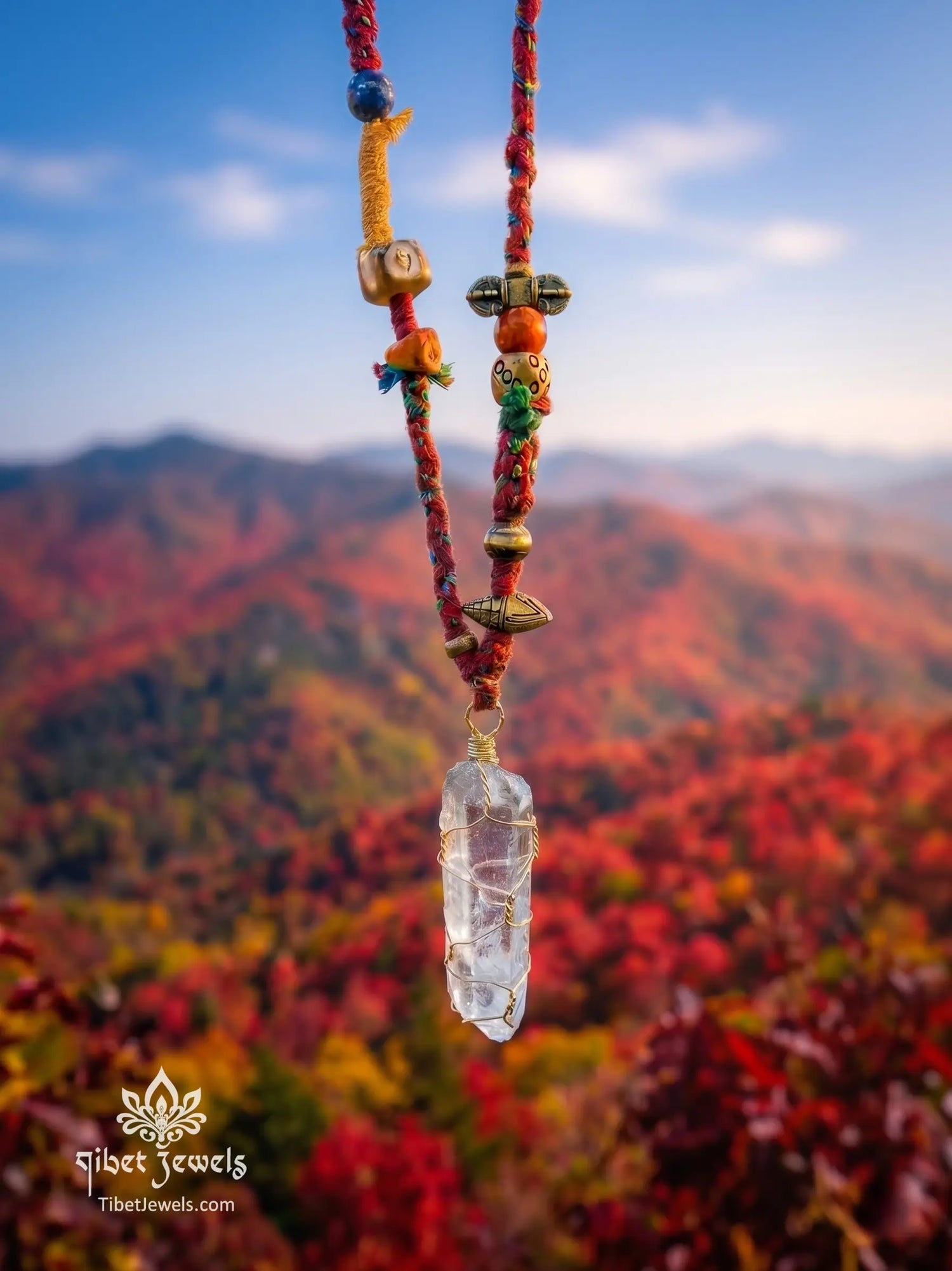 Handwoven Tibetan spirit cord necklace featuring an uncut Himalayan raw crystal pendant, brass Vajra, old Dzi, and Yak bone Chitipati.