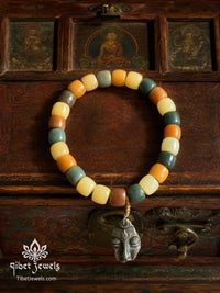 The "Inward Gaze" Multicolor Bodhi Root Bracelet | Tibetan Silver Buddha Amulet