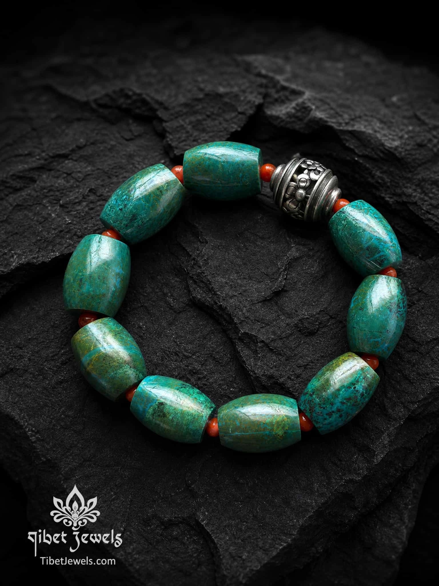 Close-up of Phoenix Stone bracelet showing natural turquoise-green stone variation.