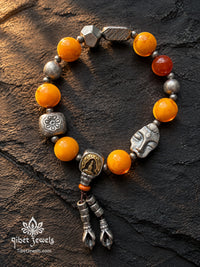 The "Sun & Resolve" Natural Beeswax Amber Bracelet | Tibetan Silver