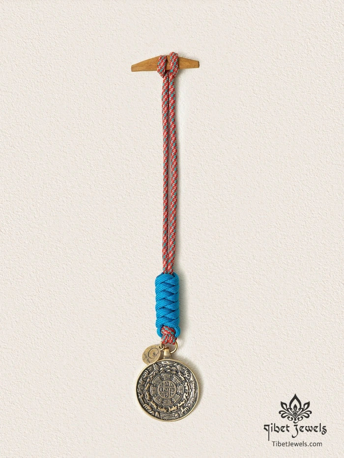 Close-up of antiqued brass bagua plaque with Eight Trigrams and zodiac
