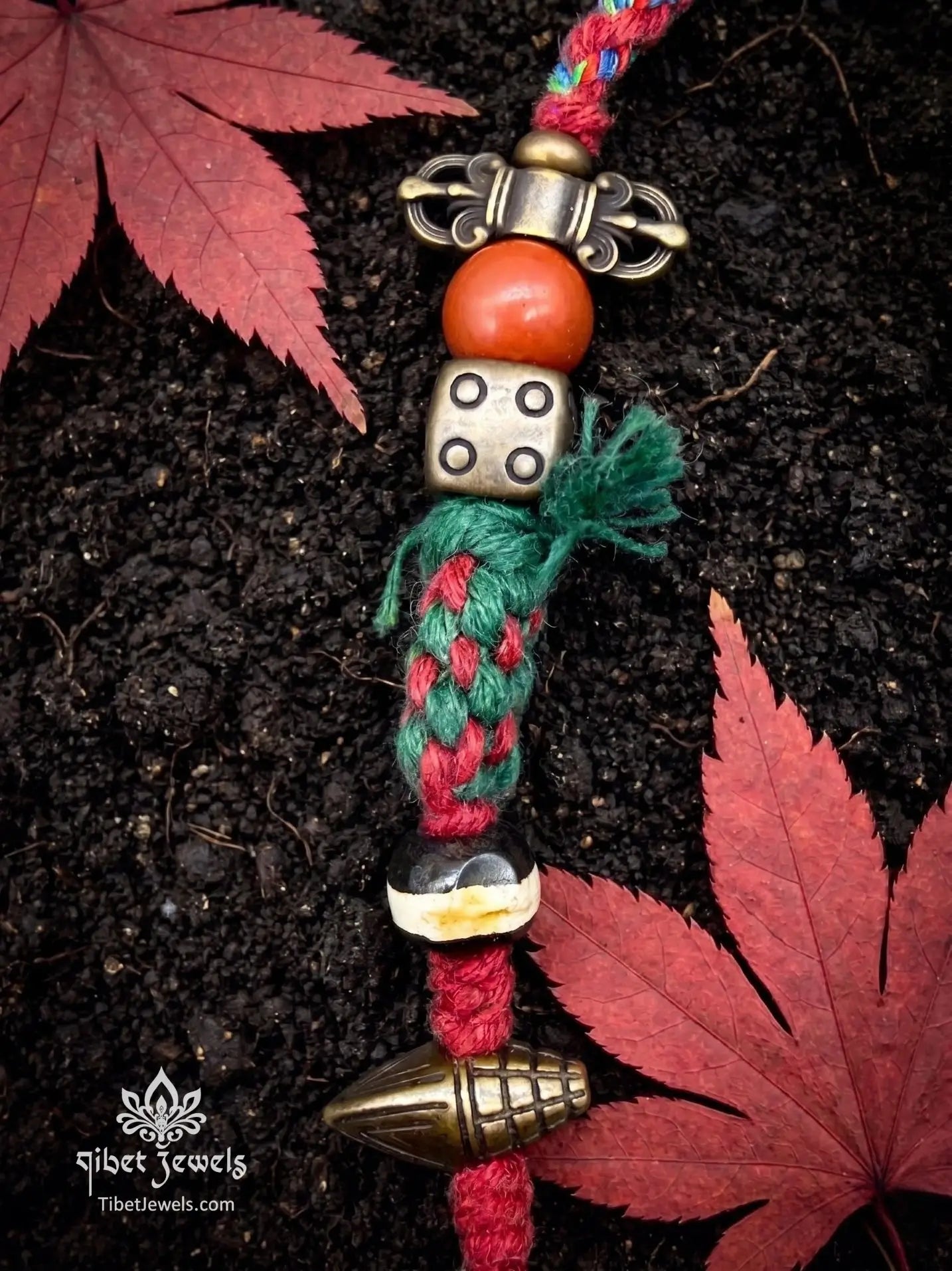 Handwoven Tibetan spirit cord necklace featuring an uncut Himalayan raw crystal pendant, brass Vajra, old Dzi, and Yak bone Chitipati.