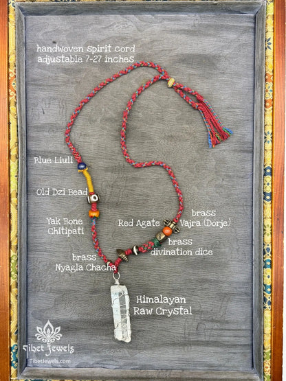 Handwoven Tibetan spirit cord necklace featuring an uncut Himalayan raw crystal pendant, brass Vajra, old Dzi, and Yak bone Chitipati.