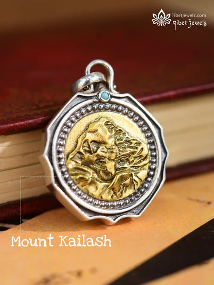 Detail of natural turquoise stone and antiqued S925 sterling silver bail on Tibetan Kailash pendant.