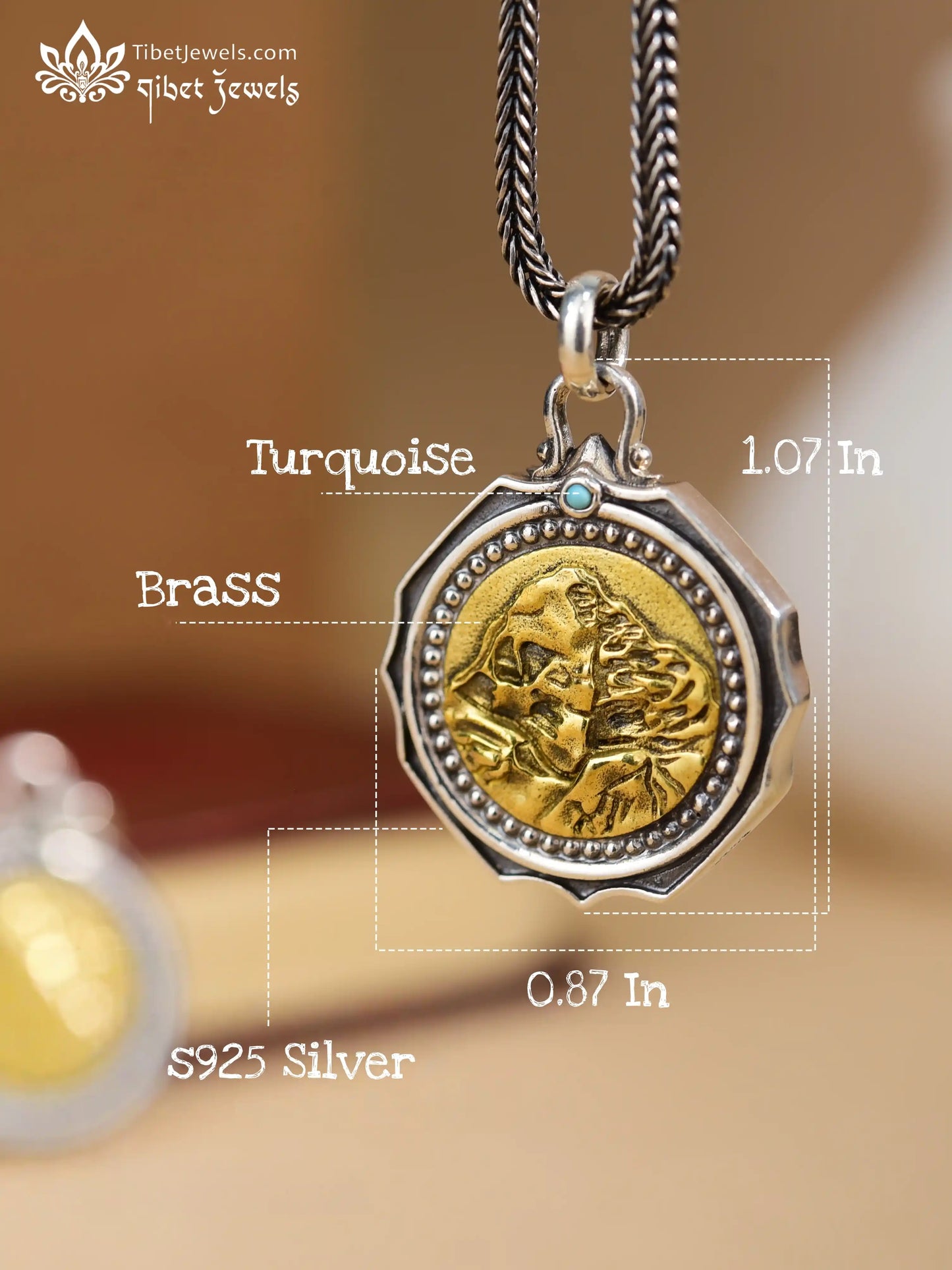 Detail of engraved Tibetan Om Mani Padme Hum mantra script on silver oracle lake pendant reverse.