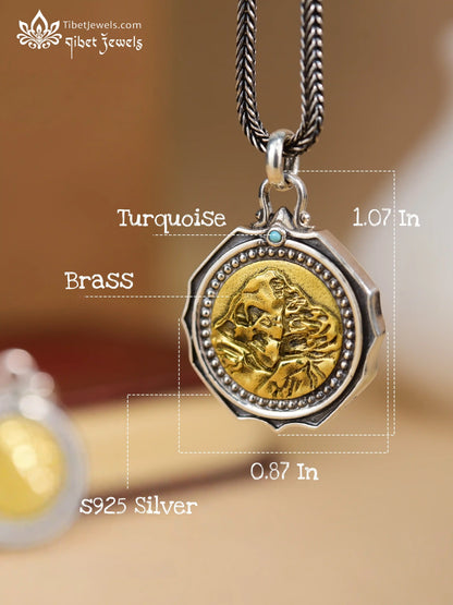 Detail of engraved Tibetan Om Mani Padme Hum mantra script on silver oracle lake pendant reverse.