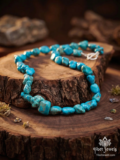 Detail of silver-plated copper toggle clasp on The Untamed Sky raw turquoise necklace.