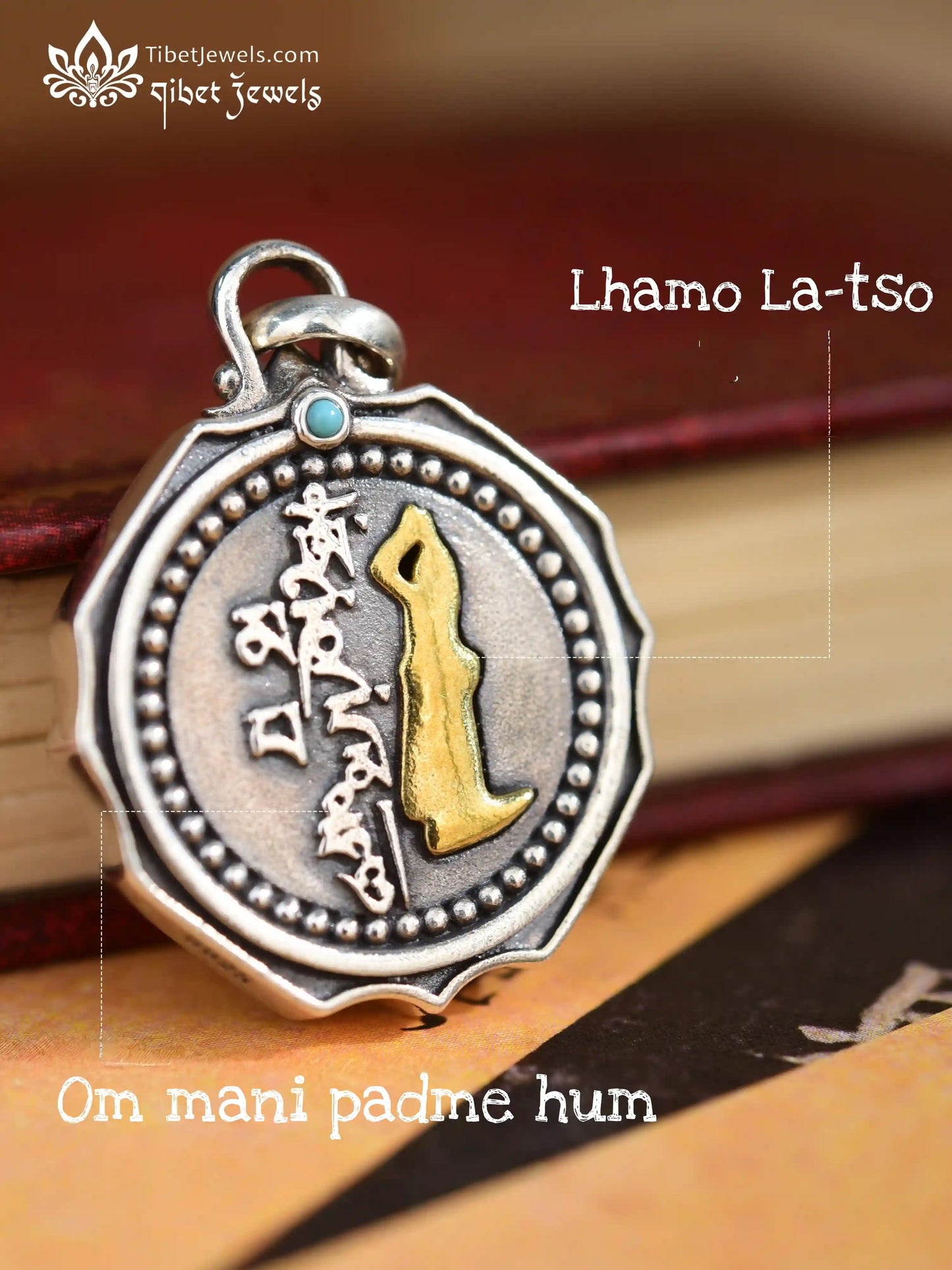 Close up of hand-carved brass Mount Kailash relief and beaded silver halo on Tibetan amulet pendant.