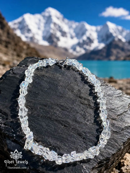 Purity Energy Frozen Light Himalayan raw clear quartz necklace on tray, silver toggle