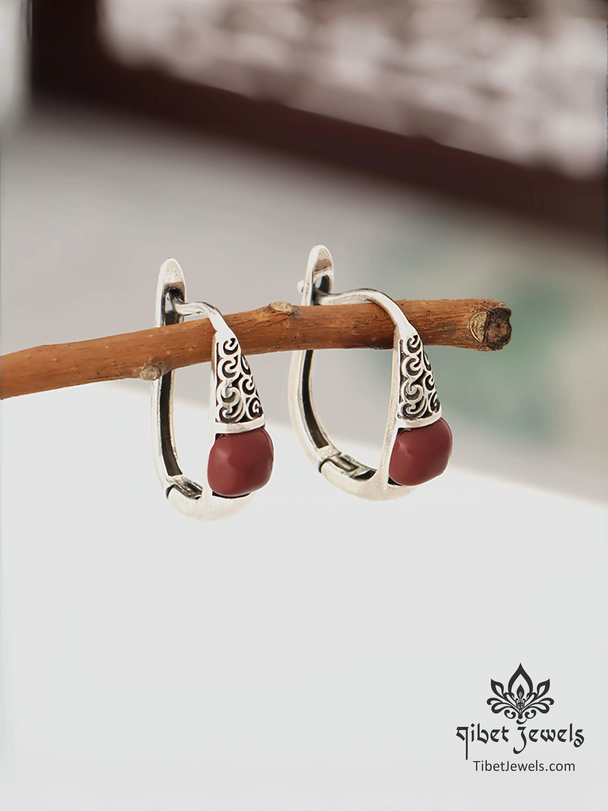 Tibetan silver "Auspicious Skies" cloud earrings with South Red Agate bead.